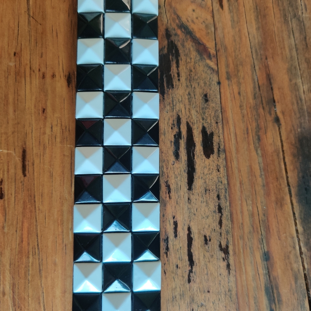 Checkered black and white triple studded belt
